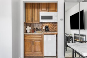 Fridge, microwave, stovetop, coffee/tea maker