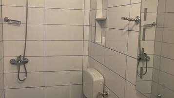 Apartment, 2 Bedrooms | Bathroom | Shower, hair dryer, slippers, bidet