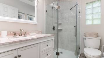 Shower, hair dryer, towels, soap