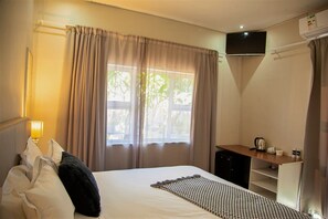 Premium bedding, minibar, desk, laptop workspace