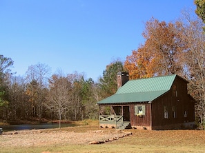 Cabin next to small pond.  Photo taken fall of 2022.