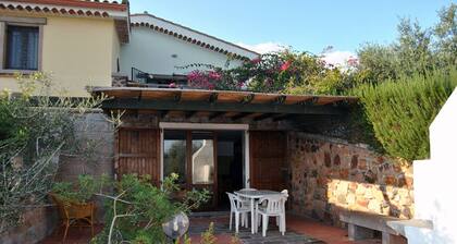 Appartement au rez-de-chaussée, véranda avec barbecue, jardin, court de tennis