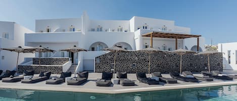 Seasonal outdoor pool, pool umbrellas, pool loungers