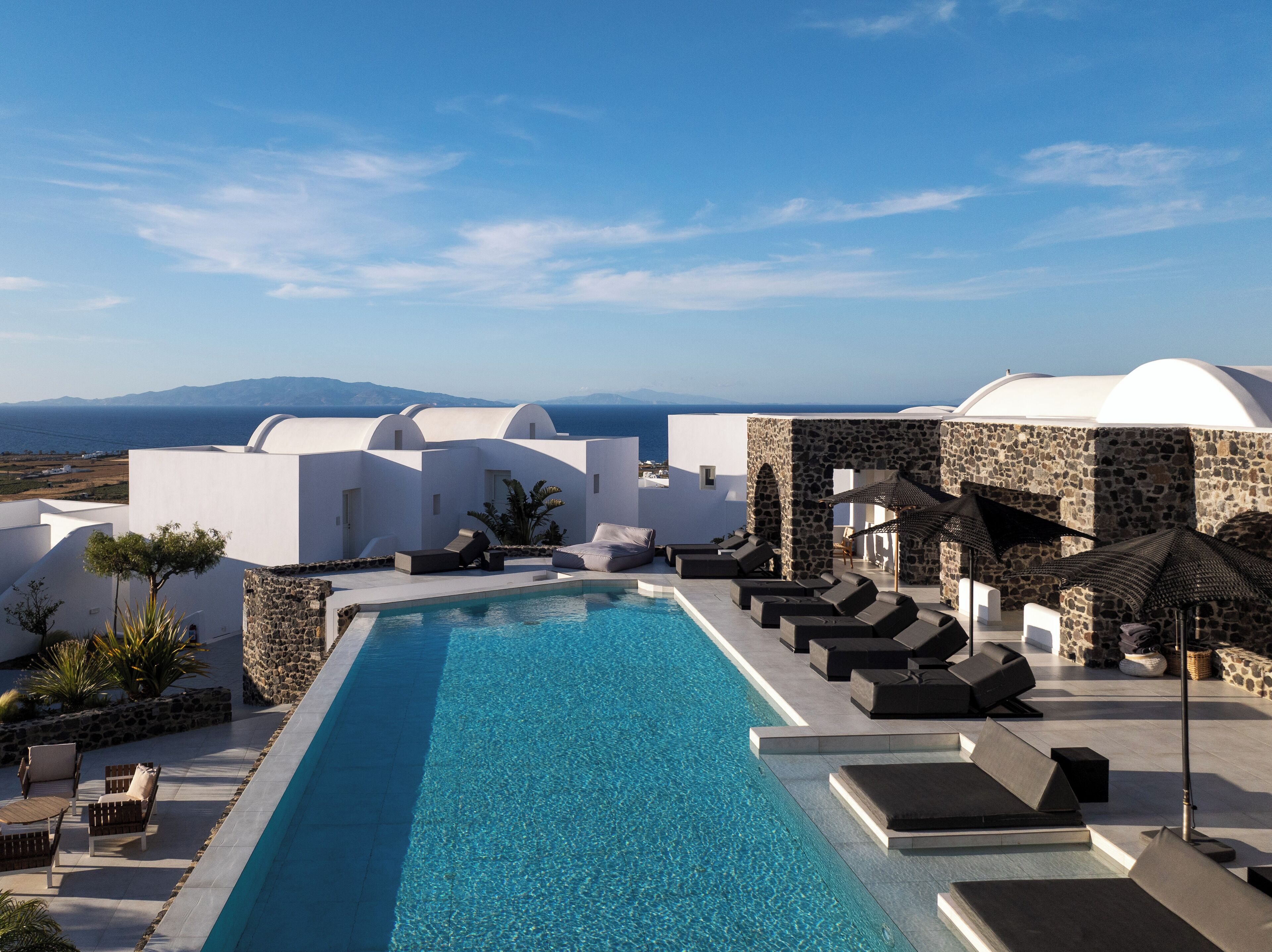 Suite (Aqua Pool) | Minibar, in-room safe, desk, laptop workspace