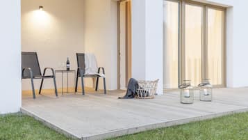 Apartamento, terraço, no piso térreo | Terraço/pátio