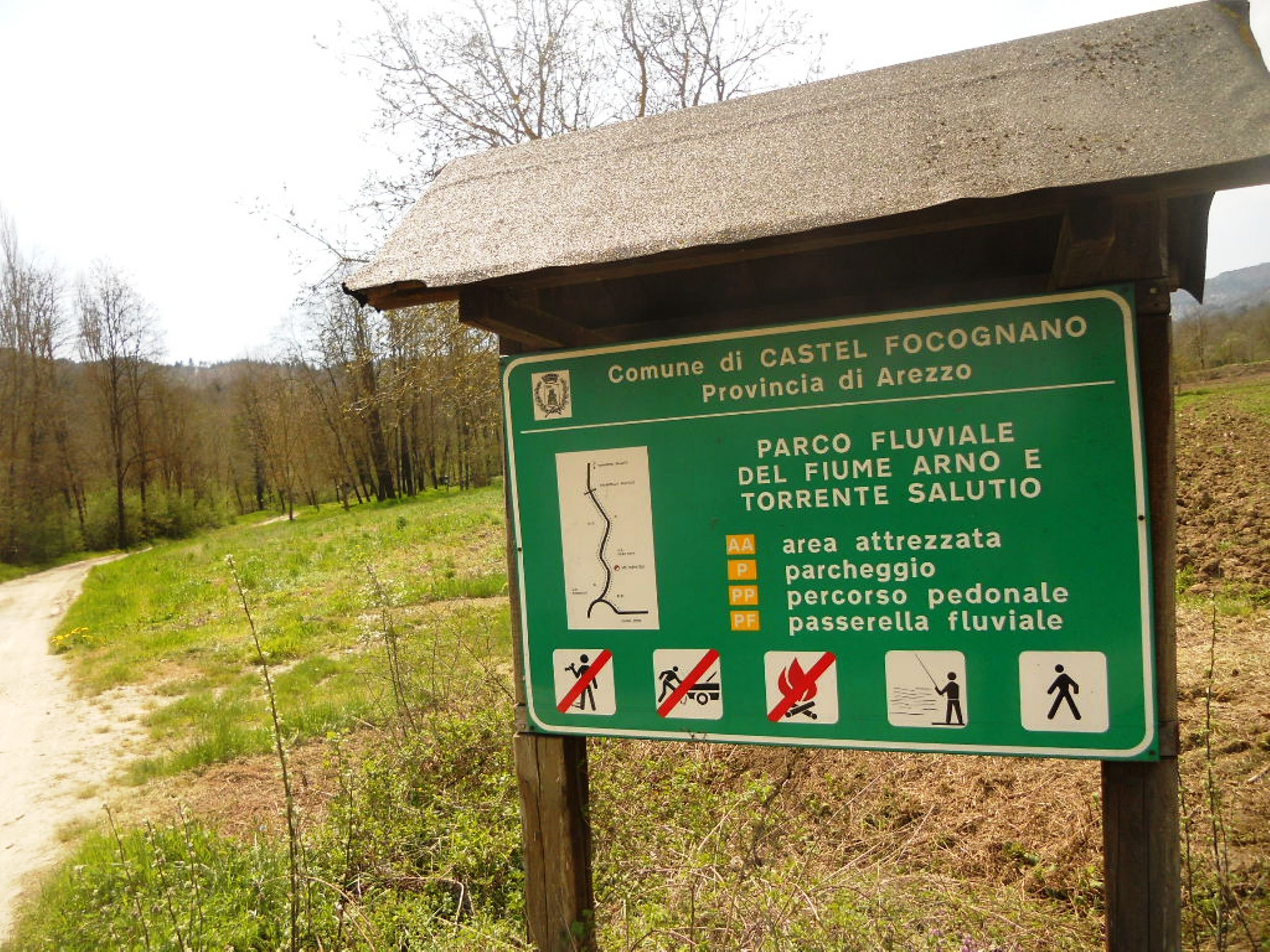 A sign for a hiking area with a map and symbols indicating no camping, no fire, no fishing, and no hiking.