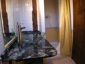Bathtub, hair dryer, towels, soap