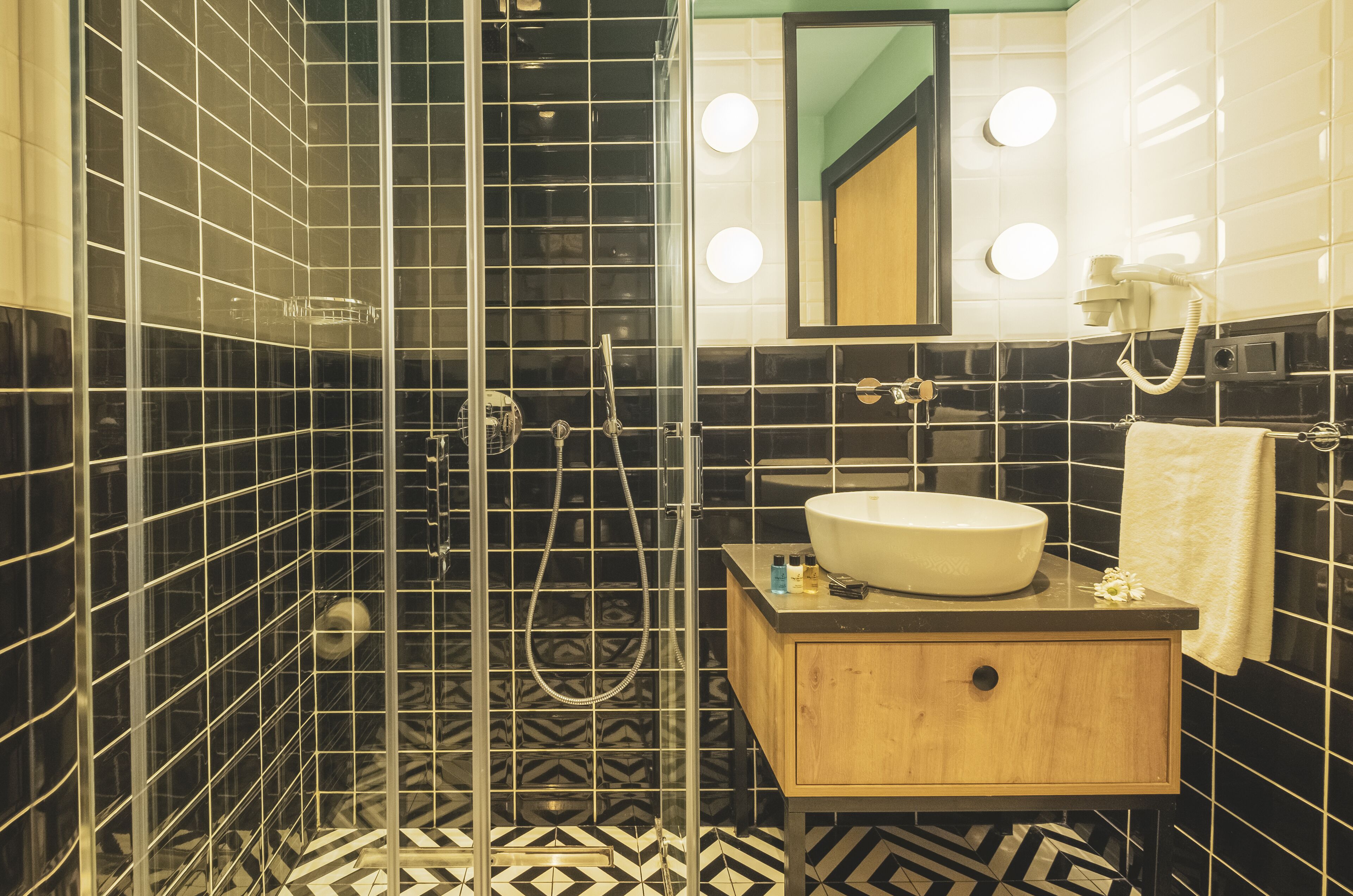 shower, rainfall showerhead, eco-friendly toiletries, hair dryer