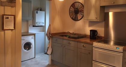 Traditional 18th Century Stone Built Scottish Cottage Close To The High Street