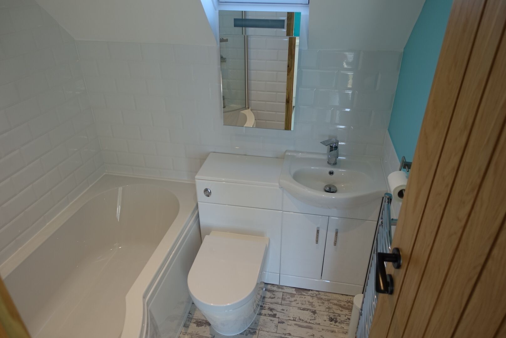 Combined shower/bathtub, hair dryer, towels, toilet paper