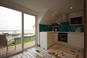 Fridge, microwave, oven, stovetop - Beautiful Seafront Beach House (Selsey)