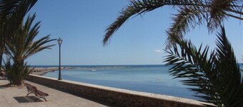 2 bedroom poolside apartment in complex by the sea, next to sandy beaches. 