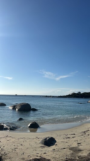On the beach, sun-loungers, beach towels