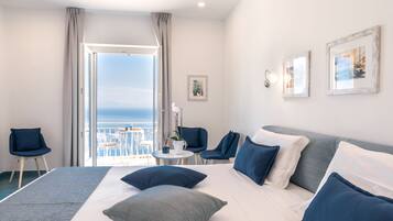 Suite monolocale Executive, vista mare | 1 camera, biancheria da letto di alta qualità, minibar