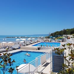 5 outdoor pools, pool umbrellas, pool loungers