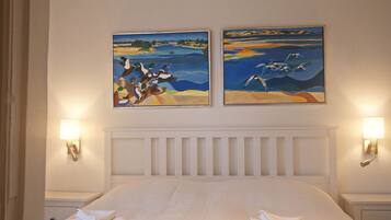 2 chambres, coffres-forts dans les chambres, fer et planche Ă repasser