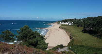 Haus am Meer Füße im Wasser