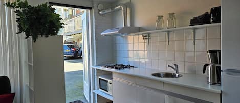 Fridge, microwave, coffee/tea maker, electric kettle