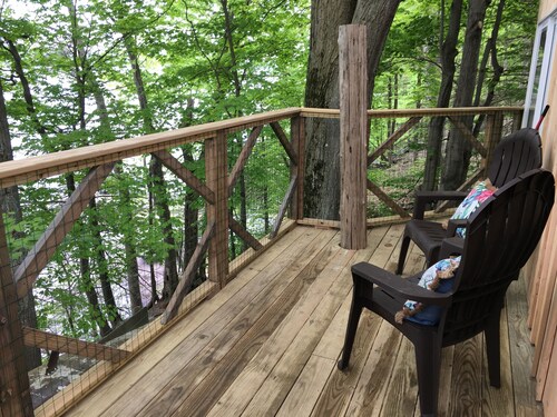 Perched over private beach on Cayuga Lake