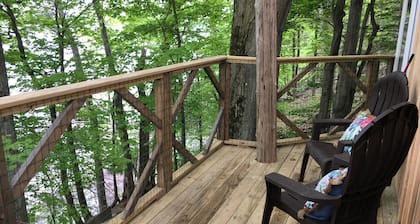 Perched over private beach on Cayuga Lake