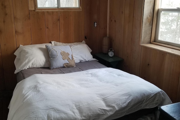 1st bedroom with lake views and new bamboo flooring