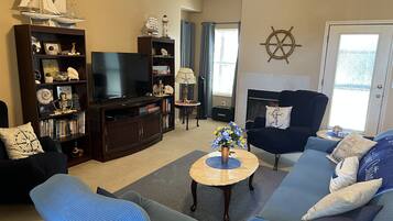 Smart TV, fireplace, DVD player, books