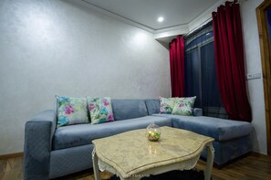 Deluxe Double Room, 1 King Bed, Non Smoking, Pool View | Living area | 34-inch flat-screen TV with satellite channels, TV - Hotel Ziryab (Chefchaouen)