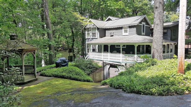 A two-story house with a covered porch and a gazebo in a lush garden. - Mount Gretna Memories! 10 minutes to Renaissance Faire (Mt Gretna)
