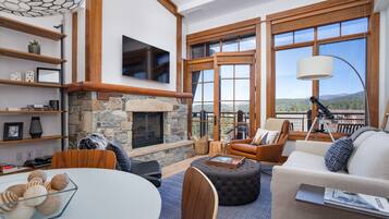 Smart TV, fireplace, books, stereo