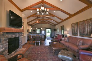 Smart TV, fireplace, books, stereo