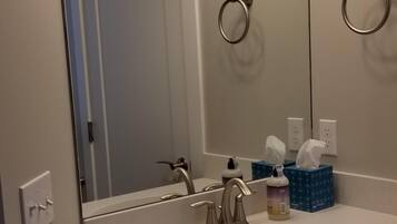 Hair dryer, towels, soap, shampoo