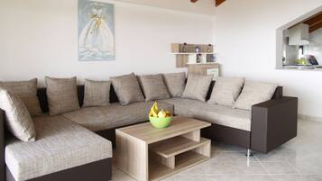 Panoramic Penthouse, 2 Bedrooms, Sea View | Living area | Flat-screen TV