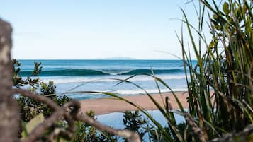 On the beach, sun-loungers, beach towels