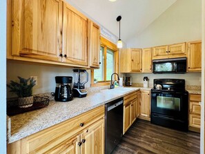 Fridge, microwave, oven, stovetop - Tree Top Cabin with access to Flathead Lake (Rollins)