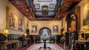 A grand hall with a high ceiling, ornate wooden beams, and a large patterned carpet. - Markree Castle (Collooney)