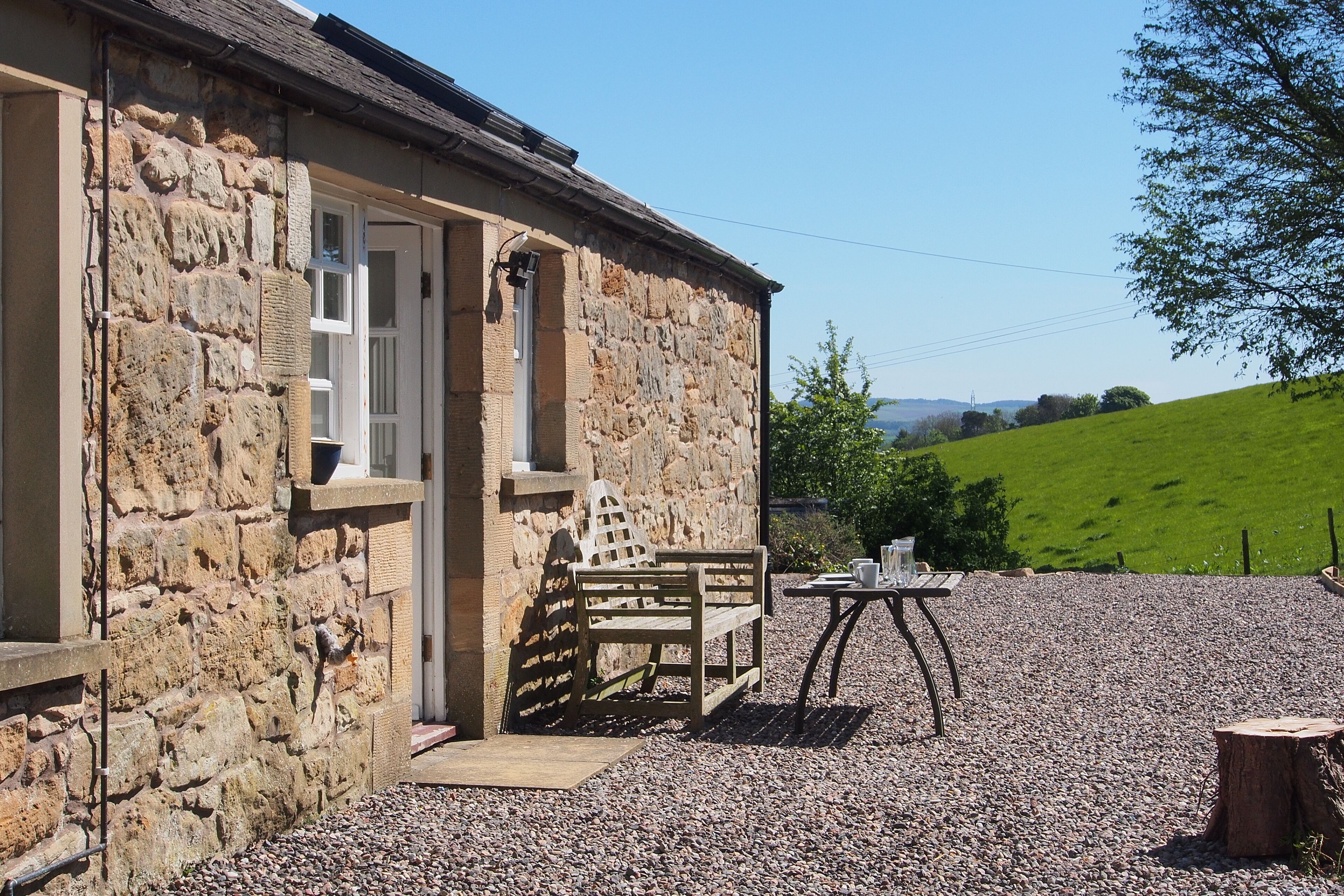 The Steading cottage with large gardens, south-facing patio with great views!