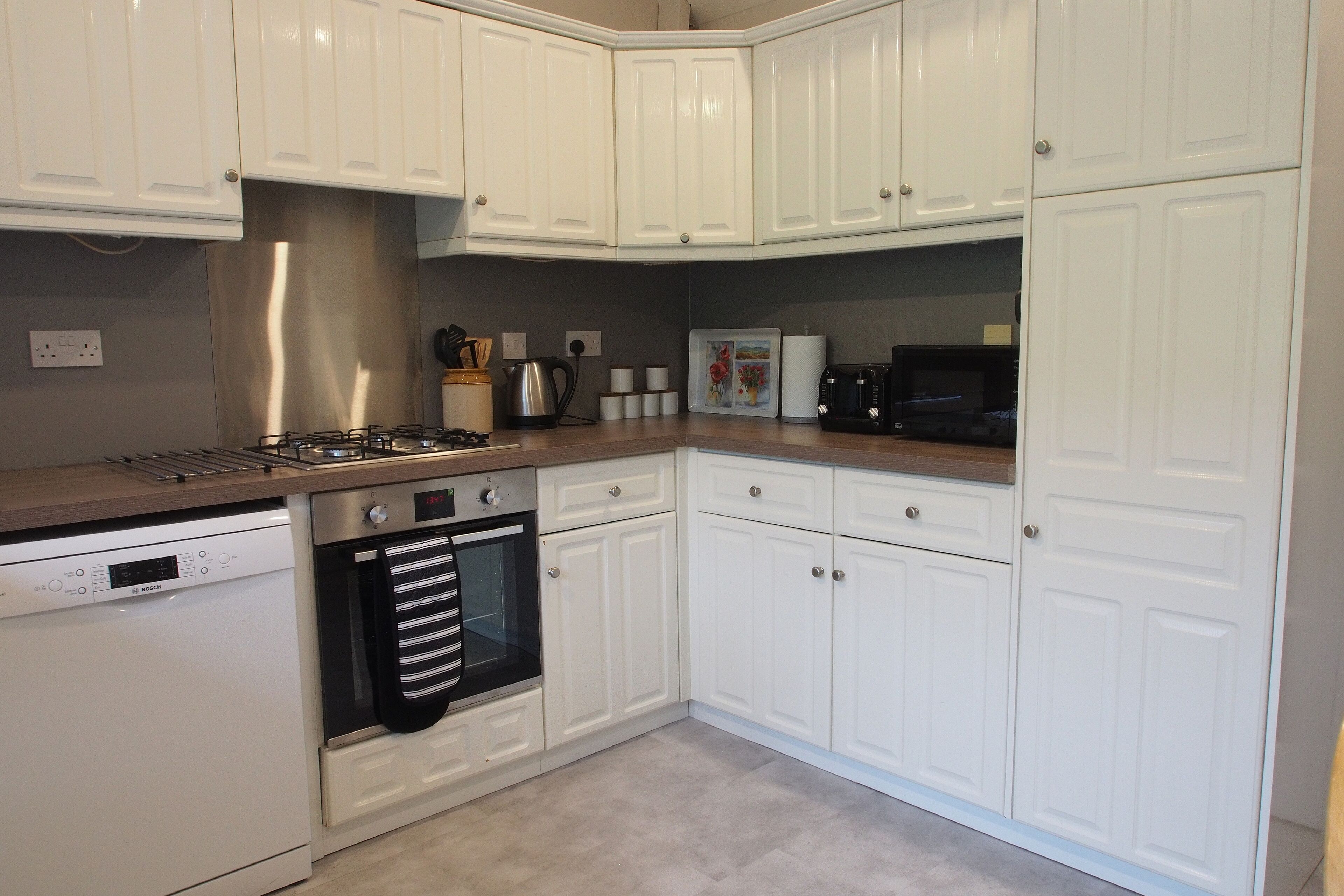 The Steading cottage with large gardens, south-facing patio with great views!