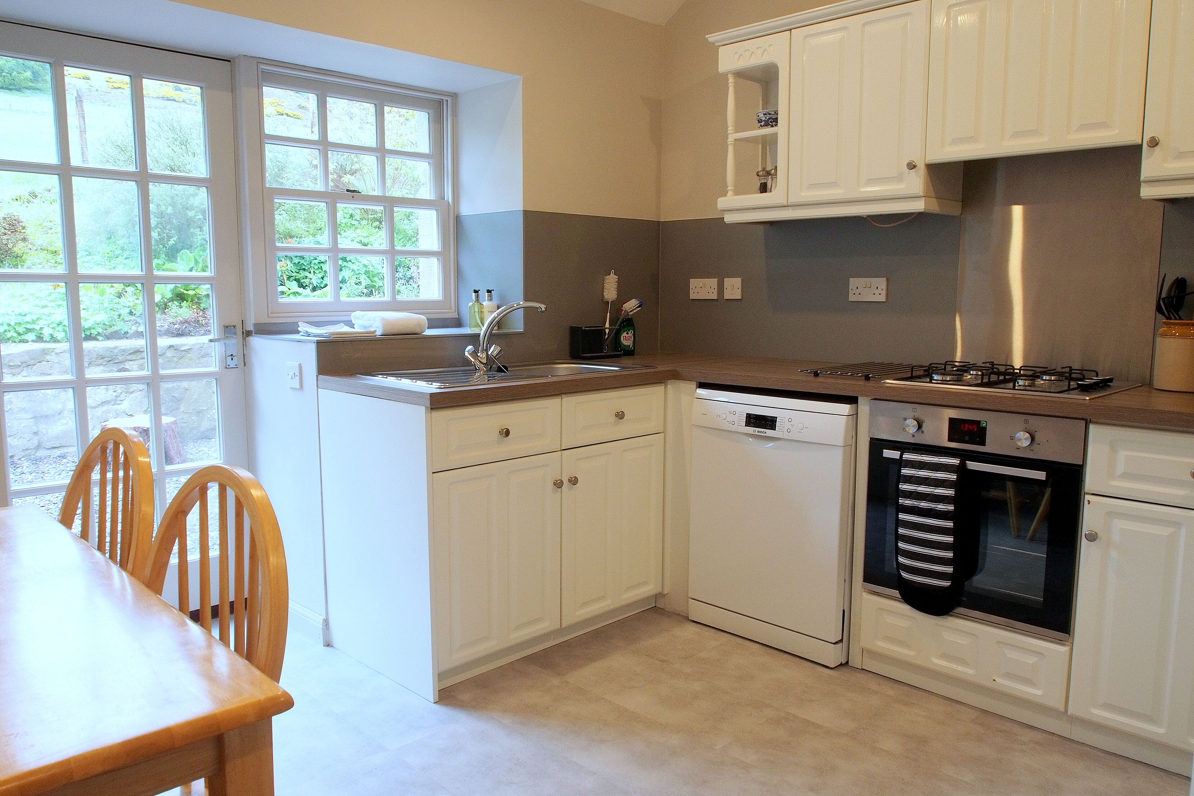 The Steading cottage with large gardens, south-facing patio with great views!