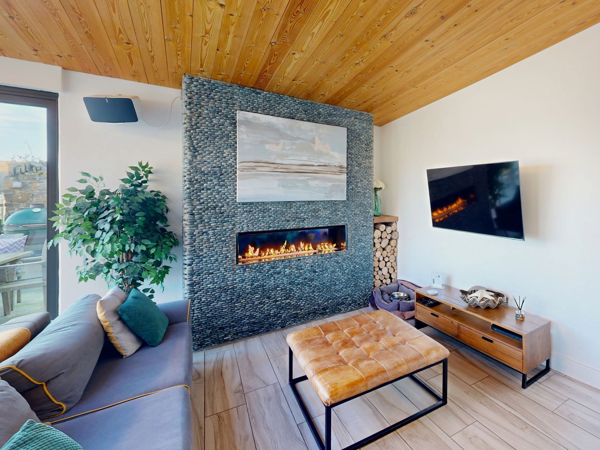 Smart TV, fireplace, video games, foosball