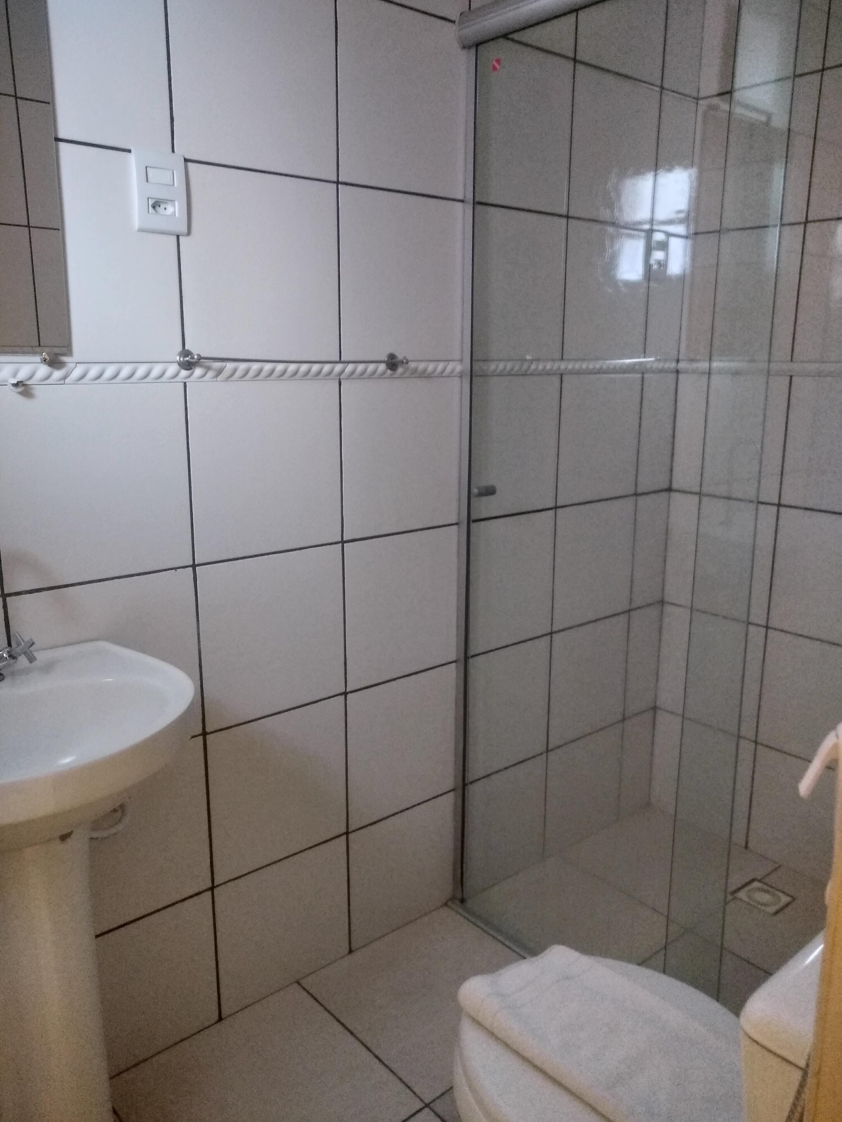 standard quadruple room, multiple beds | bathroom | shower, towels, soap, shampoo