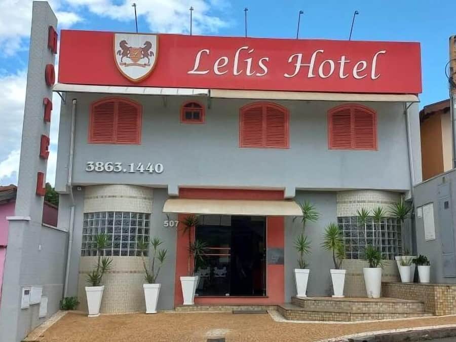 A building with a red and white facade, the name 'Lelis Hotel' prominently displayed at the top.