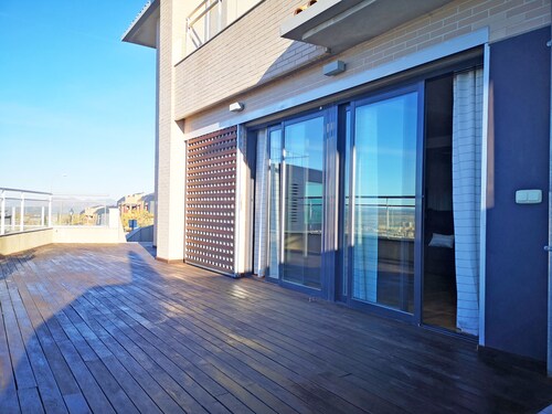 House in Granada with views and bus and commercial services.