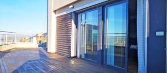 House in Granada with views and bus and commercial services.