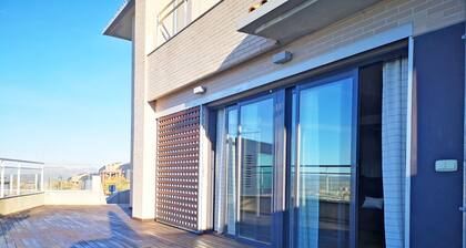 House in Granada with views and bus and commercial services.