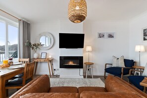 Fernseher, Kamin