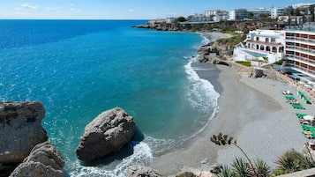 Beach nearby, sun-loungers