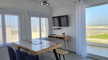 Exclusive Apartment, Multiple Bedrooms, Terrace, Beach View | In-room dining