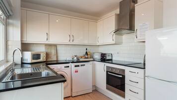 Fridge, microwave, oven, dishwasher