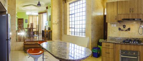 House, Multiple Bedrooms | Private kitchen | Fridge, microwave, oven, stovetop