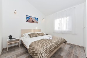 Departamento familiar (S3) | 2 habitaciones, escritorio, tabla de planchar con plancha y wifi gratis 